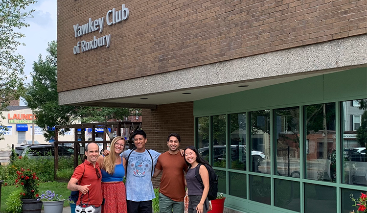 LIVELY Volunteers in front of a Boys and Girls Club of Boston site.