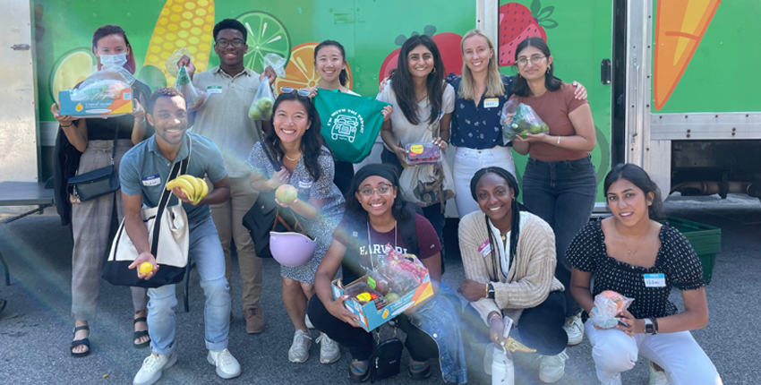 A group of students in front of a Fresh Truck mobile market